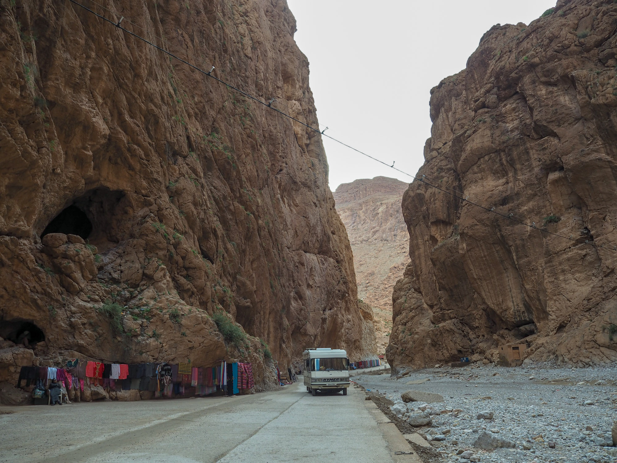 Classic Hymer motorhome driving through the Todra Gorge, Morocco