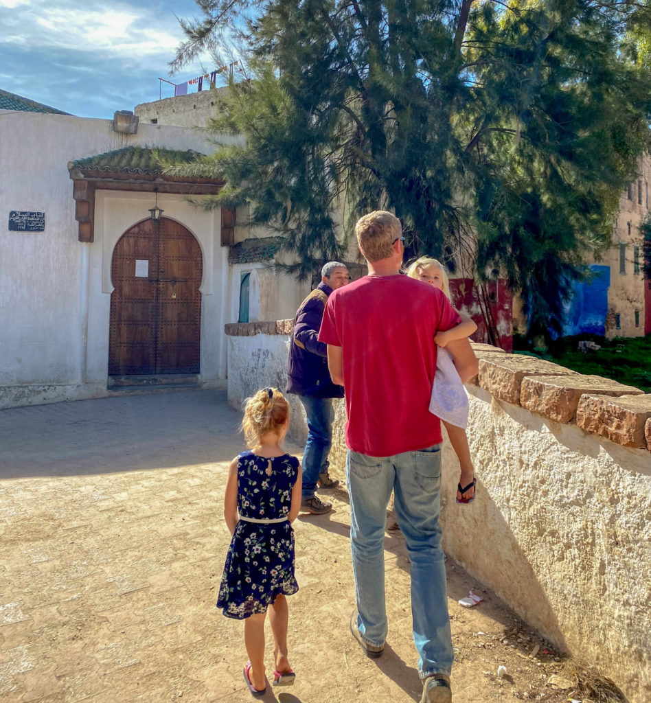 Father with 2 small daughters exploring Sefrou, Morocco