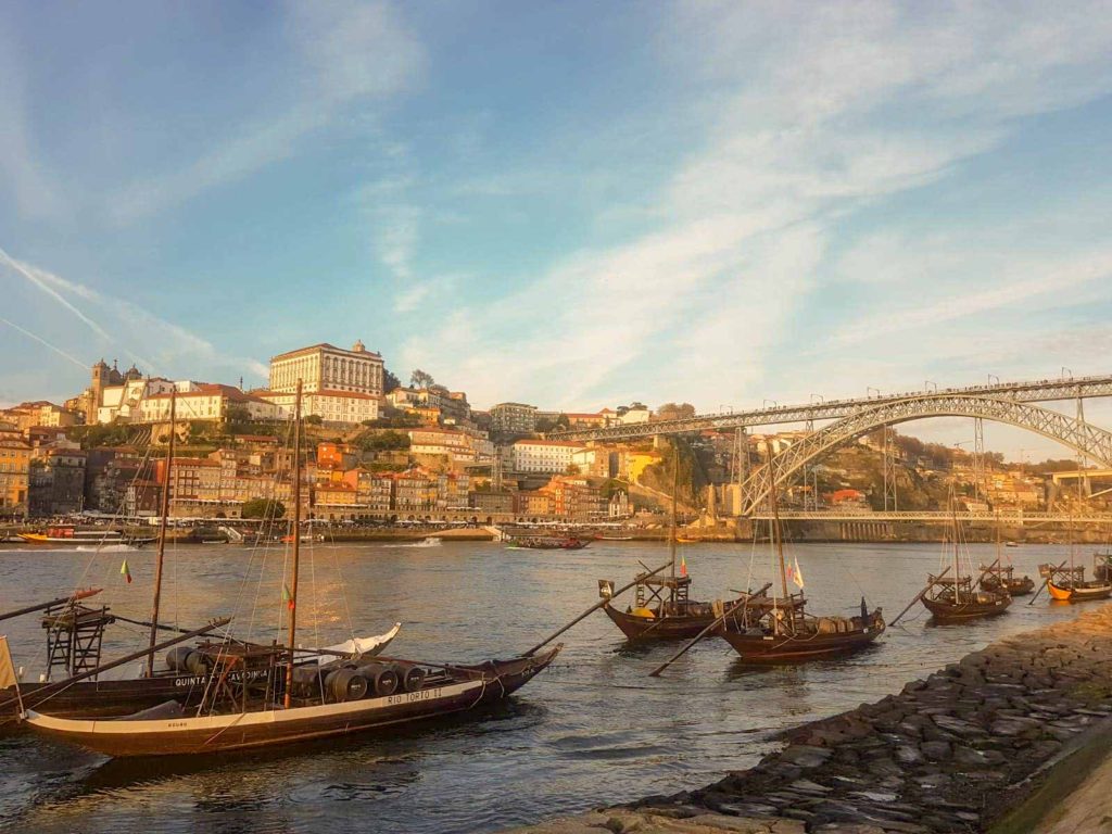 Looking across the river in Porto, with traditional port boats lined up in the foreground