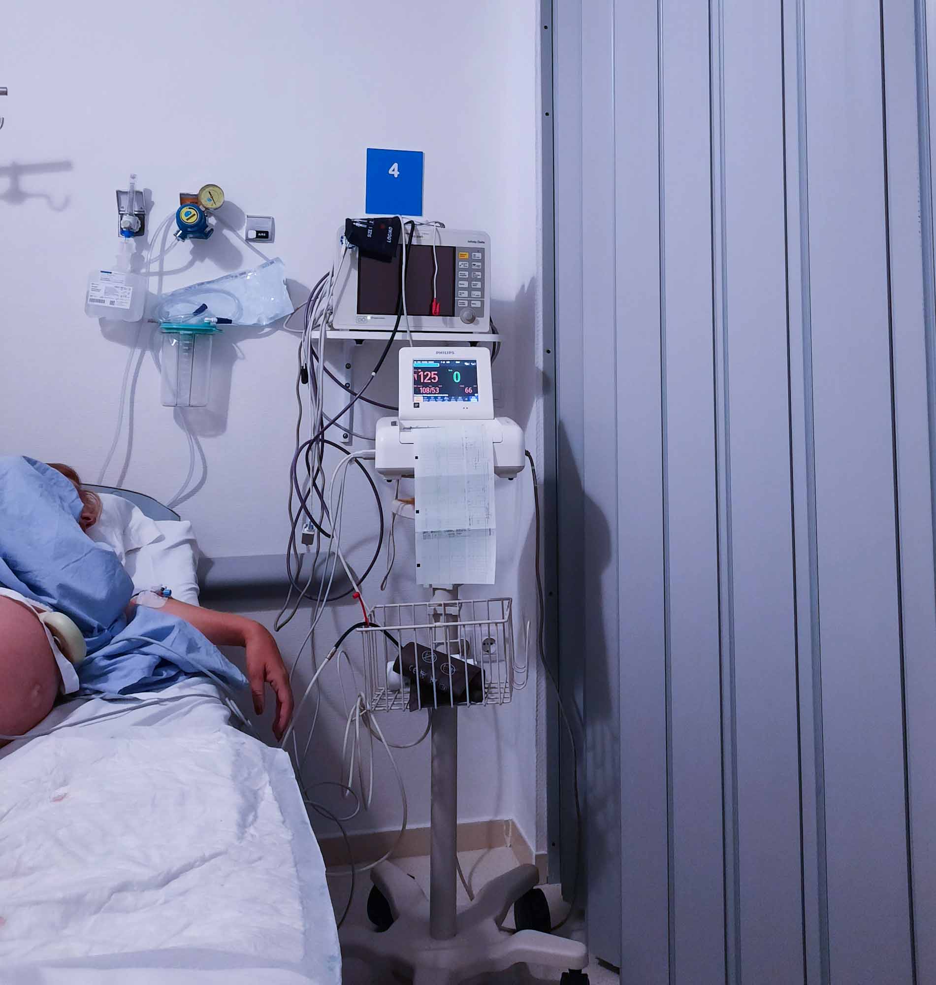 Inside a hospital room with a pregnant woman under observation