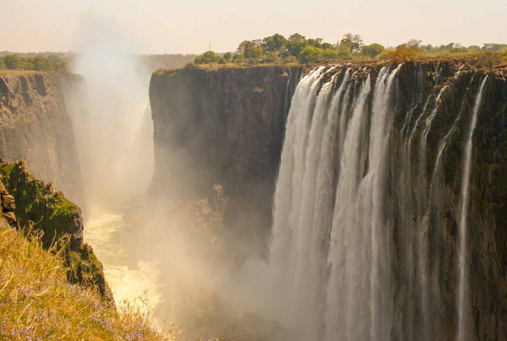 View of the cascading water and spray at Victoria falls, Zambia