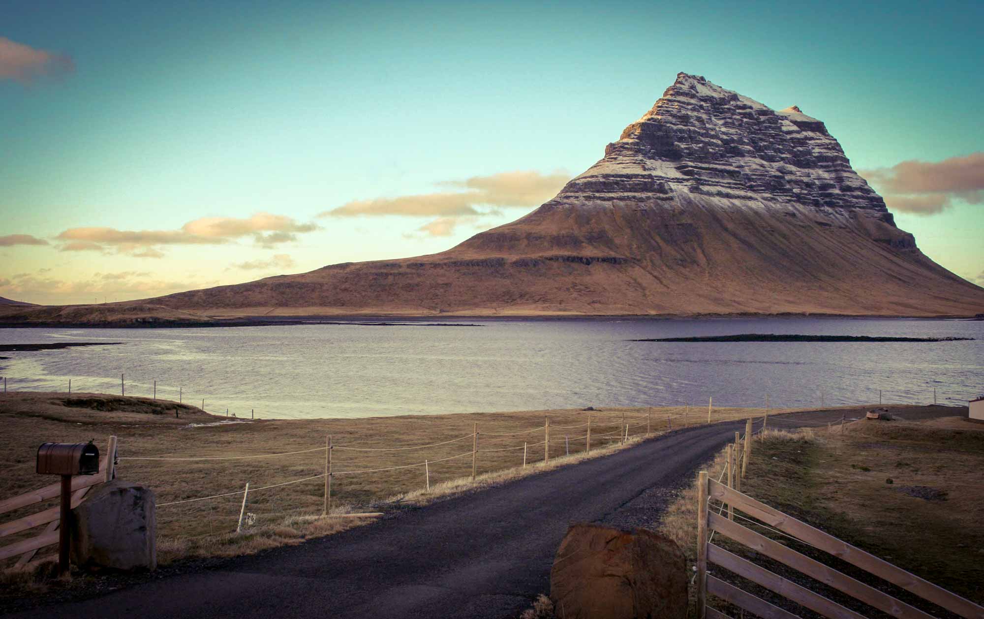 View across water of Mount Kirkjufell (Church Mountain), Iceland