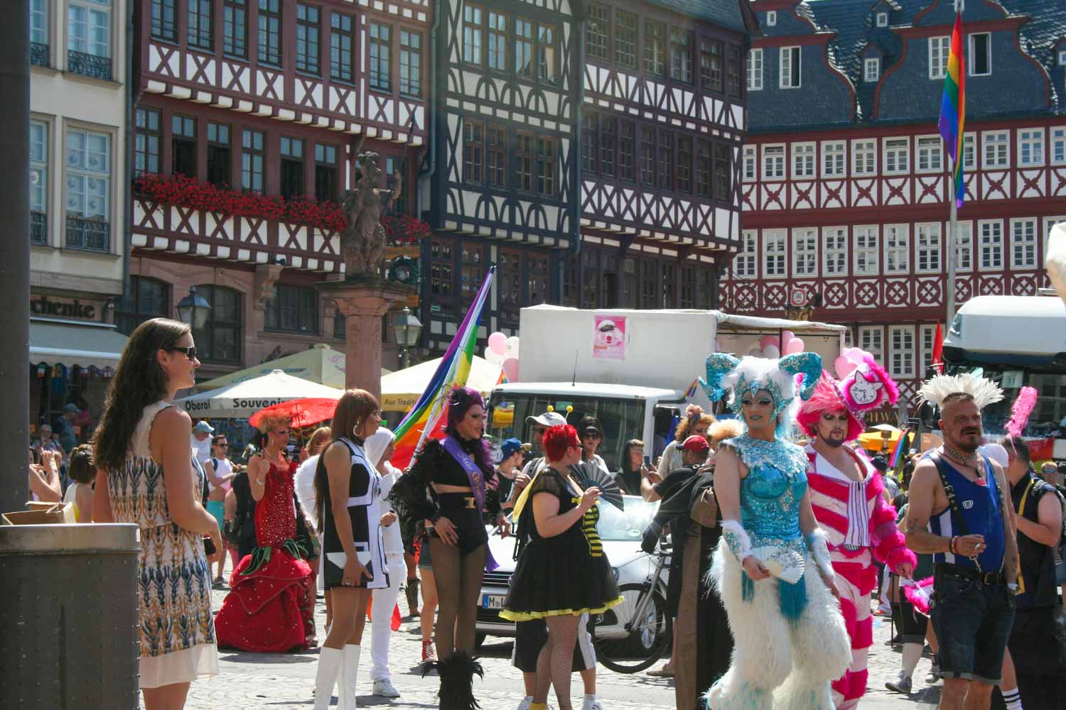 People dressed in colourful costumes at a gay pride event