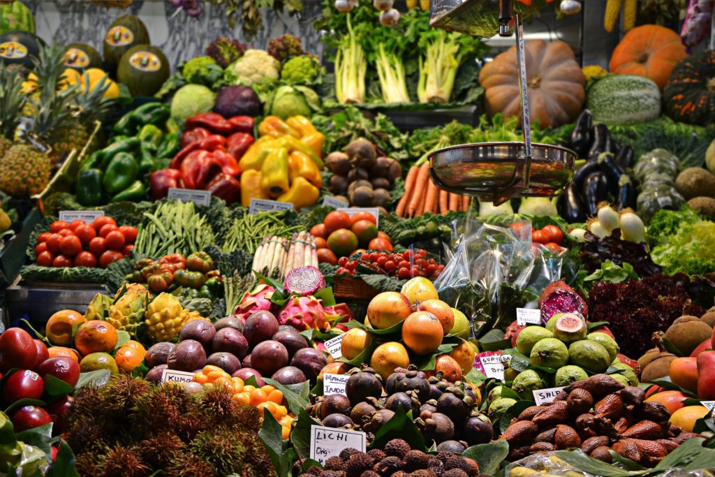 Fruit and vegetables arranged on a market stall