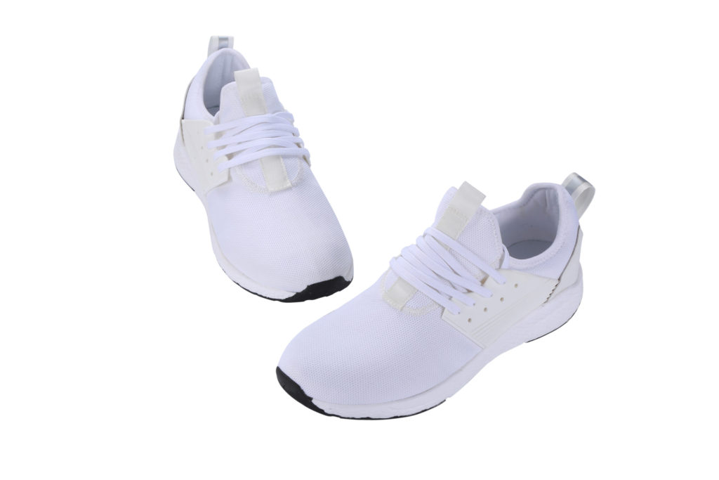 White Loom Footwear trainers against a white background